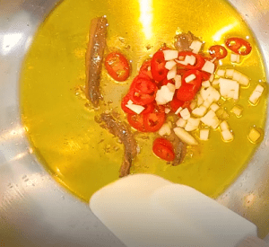 Cooking Pasta Puttanesca