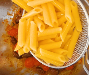 Cooking Pasta Puttanesca
